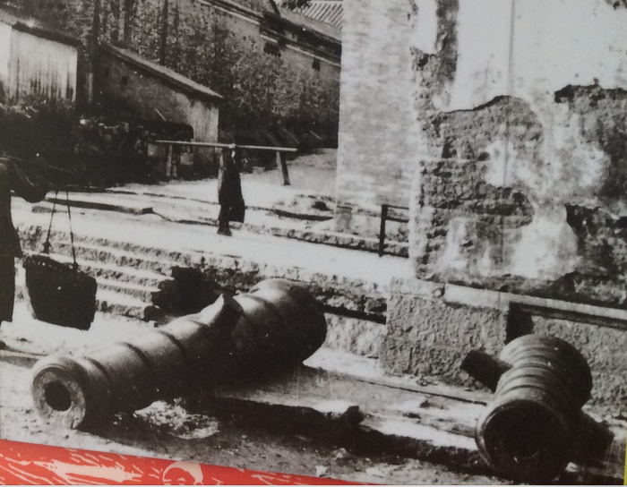 A photo of the cannons from the gatehouse laying discarded after the Japanese had demolished the gatehouse. 